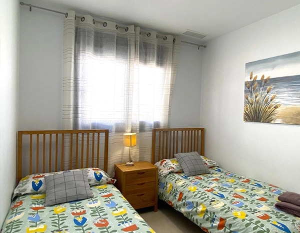 2 dormitorios con solárium